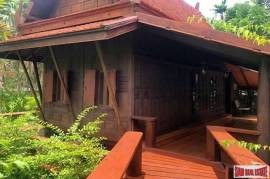 Traditional Thai Style House with Six Bedrooms and Wrap Around Terrace for Sale in Laksi