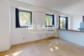 Appartement T2 en rez de jardin + place de parking