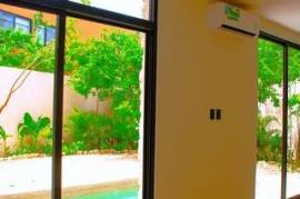 Luxurious Villa with 4 Bedrooms, Garden, and Pool in a Secure Community