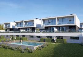 New 4 bedroom villa, with garden and terrace, in a private condominium with swimming pool, next to the Retail Park in Eiras.