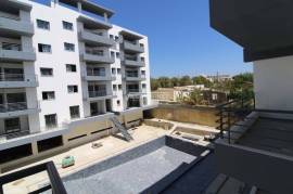 Last new 2 bedroom apartment inserted in a condominium with swimming pool located in Olhão
