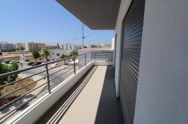 Last new 2 bedroom apartment inserted in a condominium with swimming pool located in Olhão
