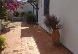 Land with 2 villas in large enclosed enclosure