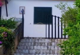 Land with 2 villas in large enclosed enclosure