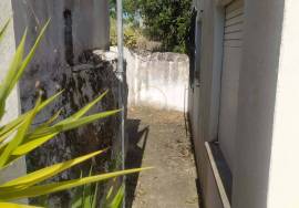 Land with 2 villas in large enclosed enclosure