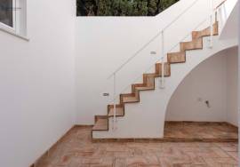 Traditional Charm with a Modern Touch – Typical 2 Bedroom Villa from Olhanense with Rooftop and Patio