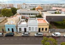 Traditional Charm with a Modern Touch – Typical 2 Bedroom Villa from Olhanense with Rooftop and Patio