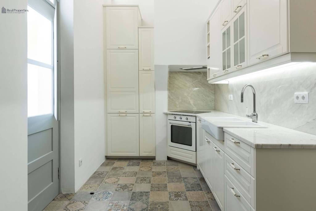 Traditional Charm with a Modern Touch – Typical 2 Bedroom Villa from Olhanense with Rooftop and Patio