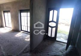 Unfinished house on a 820m2 plot.