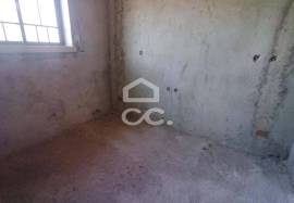 Unfinished house on a 820m2 plot.