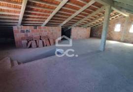 Unfinished house on a 820m2 plot.