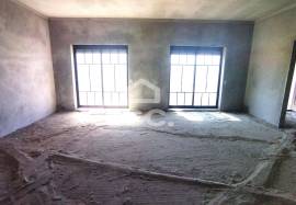 Unfinished house on a 820m2 plot.