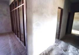 Unfinished house on a 820m2 plot.