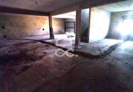 Unfinished house on a 820m2 plot.