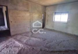Unfinished house on a 820m2 plot.