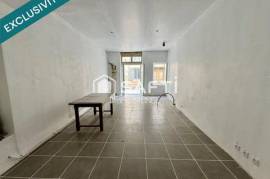 Immeuble comprenant local commercial et appart T4