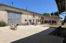 Charming Stone House with Outbuildings and Enclosed Courtyard  Near Sauze-Vaussais - €129,950