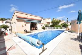 STUNNING 5 BEDROOM HOME WITH POOL, SUMMER KITCHEN AND GARAGE