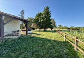 Magnifique propriete avec maison de plain pied et grange