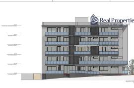 Land with a project of 46 dwellings, in Quarteira. Investment.