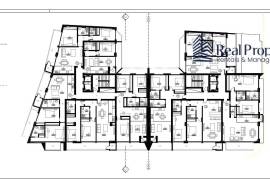 Land with a project of 46 dwellings, in Quarteira. Investment.