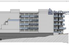 Land with a project of 46 dwellings, in Quarteira. Investment.