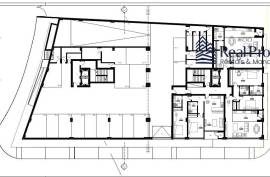 Land with a project of 46 dwellings, in Quarteira. Investment.
