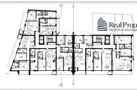Land with a project of 46 dwellings, in Quarteira. Investment.