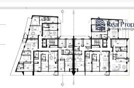 Land with a project of 46 dwellings, in Quarteira. Investment.