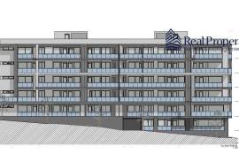 Land with a project of 46 dwellings, in Quarteira. Investment.