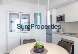 Bright holiday rental apartment with sea views and pool in Torrox Costa.