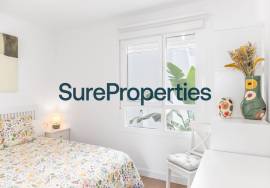 Bright holiday rental apartment with sea views and pool in Torrox Costa.