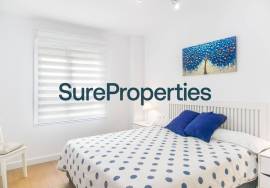 Bright holiday rental apartment with sea views and pool in Torrox Costa.