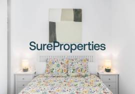 Bright holiday rental apartment with sea views and pool in Torrox Costa.