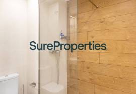 Bright holiday rental apartment with sea views and pool in Torrox Costa.