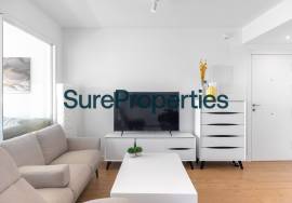 Bright holiday rental apartment with sea views and pool in Torrox Costa.