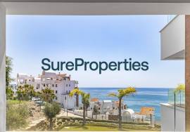 Bright holiday rental apartment with sea views and pool in Torrox Costa.
