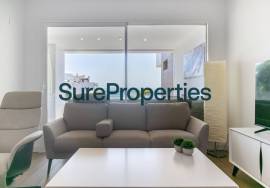 Bright holiday rental apartment with sea views and pool in Torrox Costa.