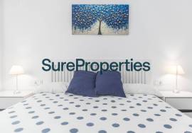 Bright holiday rental apartment with sea views and pool in Torrox Costa.