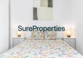 Bright holiday rental apartment with sea views and pool in Torrox Costa.
