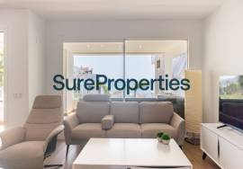 Bright holiday rental apartment with sea views and pool in Torrox Costa.