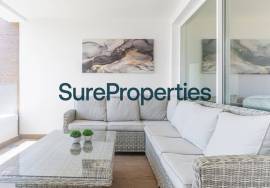 Bright holiday rental apartment with sea views and pool in Torrox Costa.