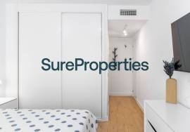 Bright holiday rental apartment with sea views and pool in Torrox Costa.