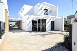 Contemporary style 3 bedroom villas with garden and swimming pool near Vilamoura/Vila Sol, Algarve