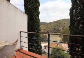 Rural Hotel of 4 floors, with 26 rooms, panoramic terrace and swimming pool, located on the bank of the River Guadiana in Guerreiros do Rio, municipality of Alcoutim.