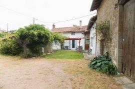 Detached renovated 5 bedroom stone house with outbuildings in quiet location - gite potential
