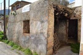 Stone house for renovation in traditional village close to town and beaches.