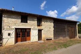 Detached stone character home, with a barn and a large garden
