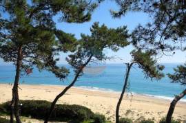 FOR SALE SEASIDE  2 APARTMENTS & SHOP WITH A TOTAL AREA OF 205 SQM ON A PLOT OF 485 SQM WITH UNLIMITED SEA VIEW IN SKALA, KEFALONIA.
