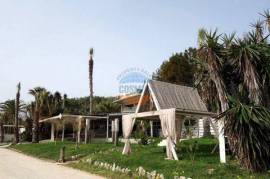 SEASIDE BEACH BAR OF 140 SQ.M- &UNFINISHED A’FLOOR OF 140 SQ.M ON THE LAND OF 8.000SQ.M IN SKALA -KEFALONIA